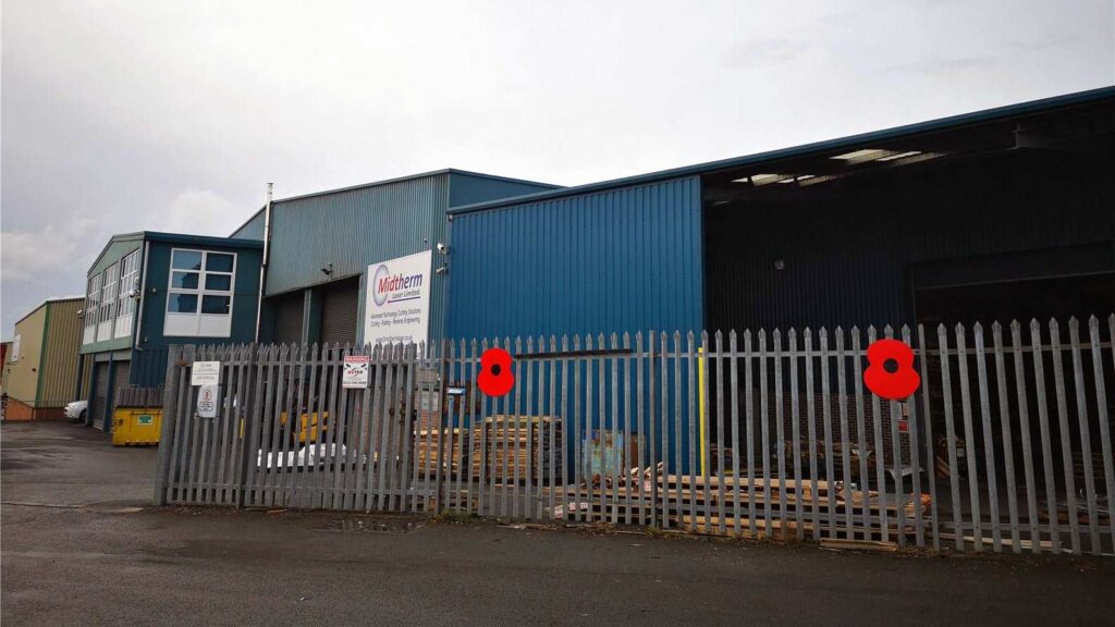 poppies on outside of Midtherm laser factory