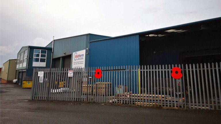 poppies on outside of Midtherm laser factory