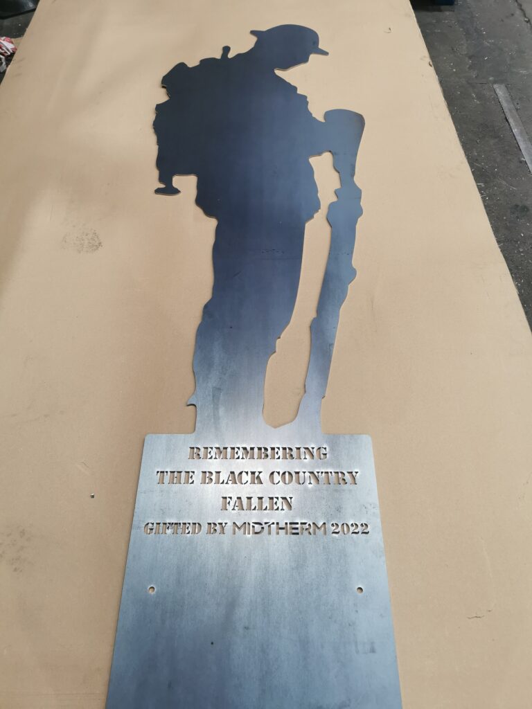 Honouring Remembrance Through Metalwork - Eric cut and ready for forming and powdercoating