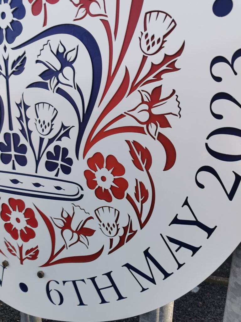 Showcasing the laser cutting of the Coroanation panels on our fences