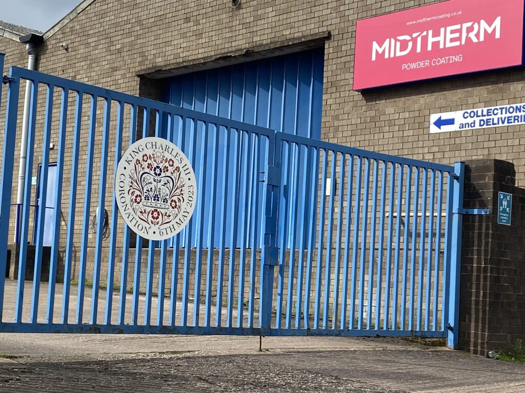 The Kings Coronation panel on the gates at Midtherm Powder Coating
