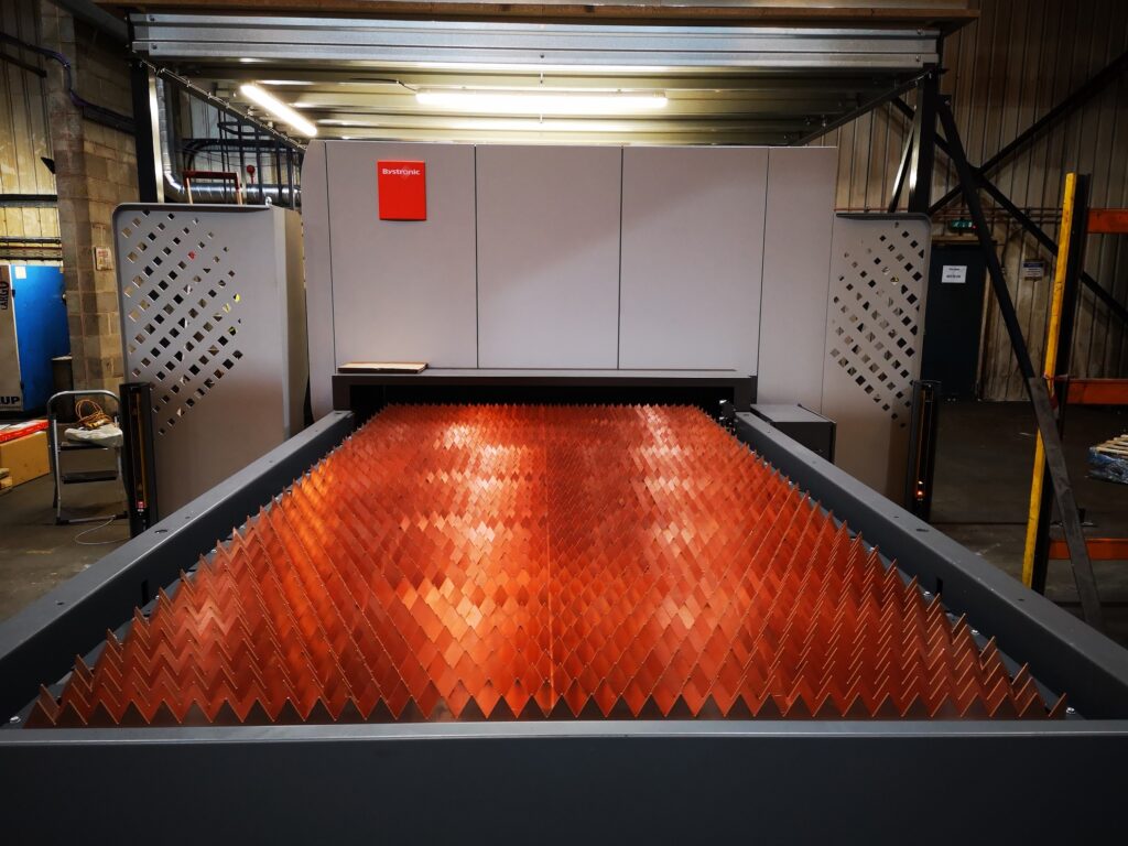 New copper slats on our 10kw fiber laser which is connected to the tower for lower energy usage 