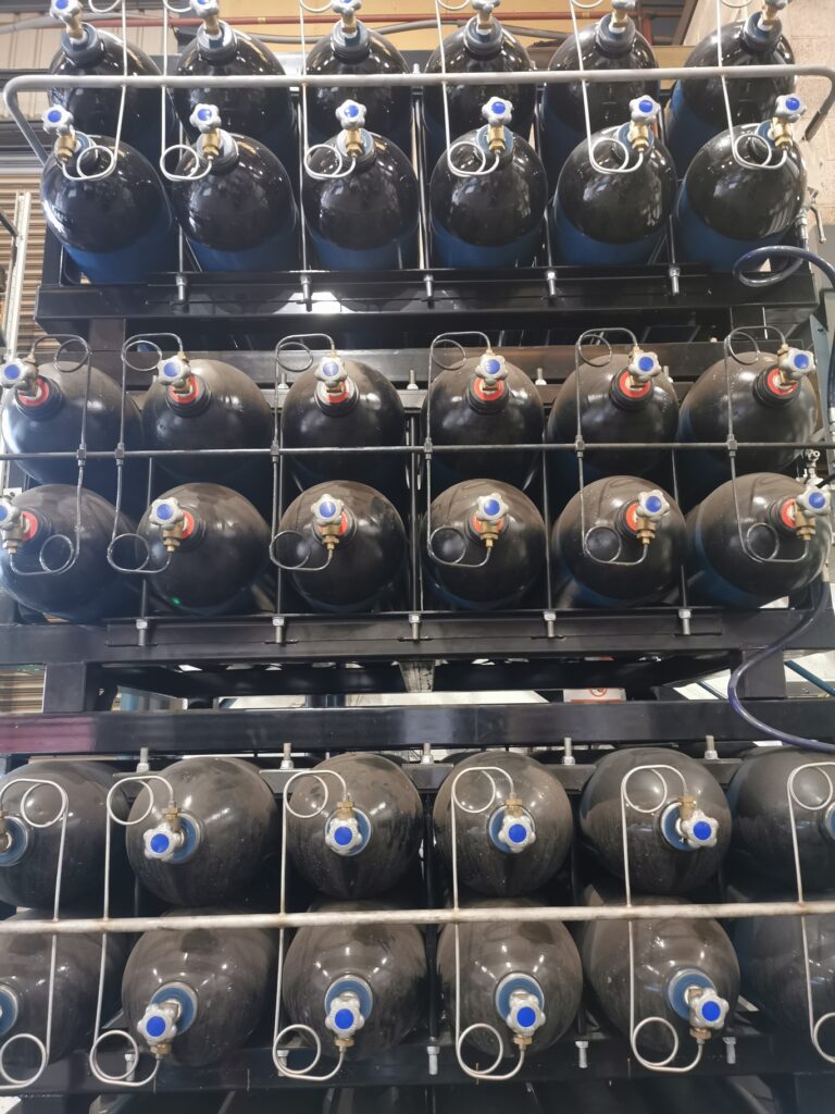 Close-up view of Midtherm Laser's nitrogen generator storage bottles, showcasing its modern design and energy-efficient features.