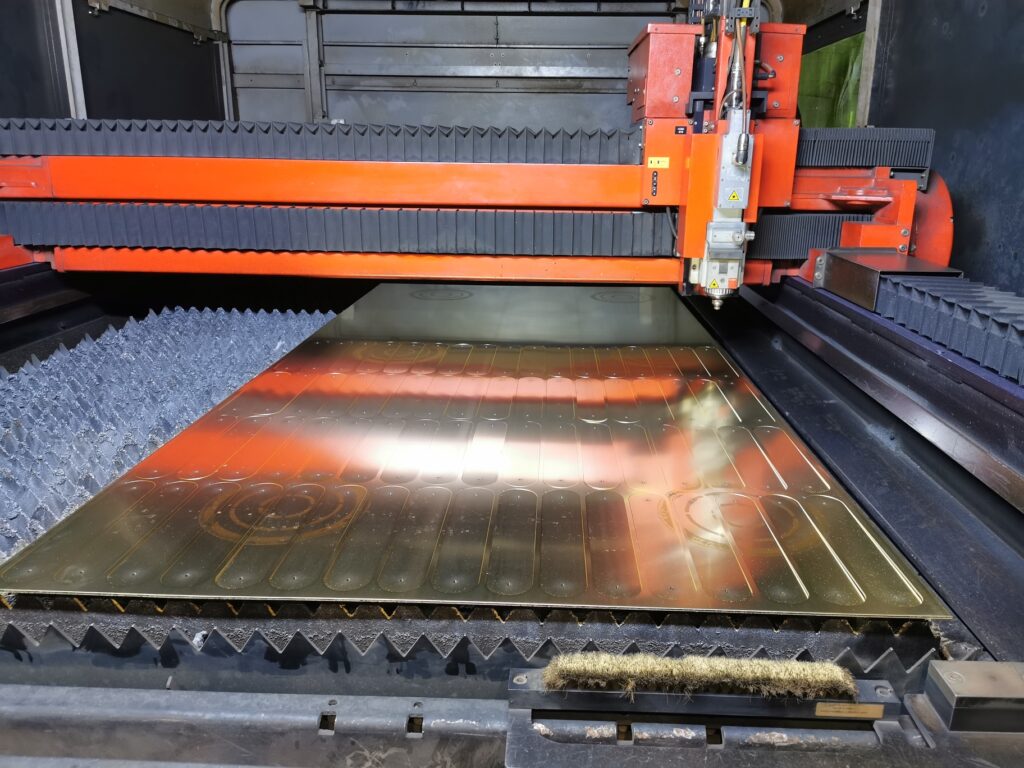 Brass ready to be cut inside the 3kw fiber laser