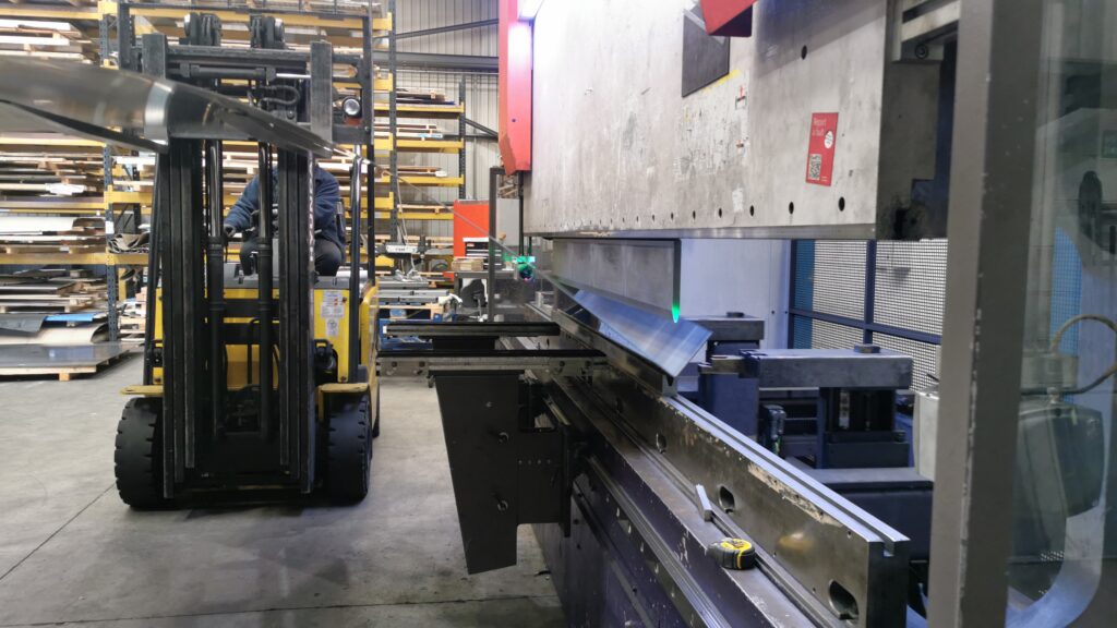 250 tonne press brake using the forklift truck to aid the bend