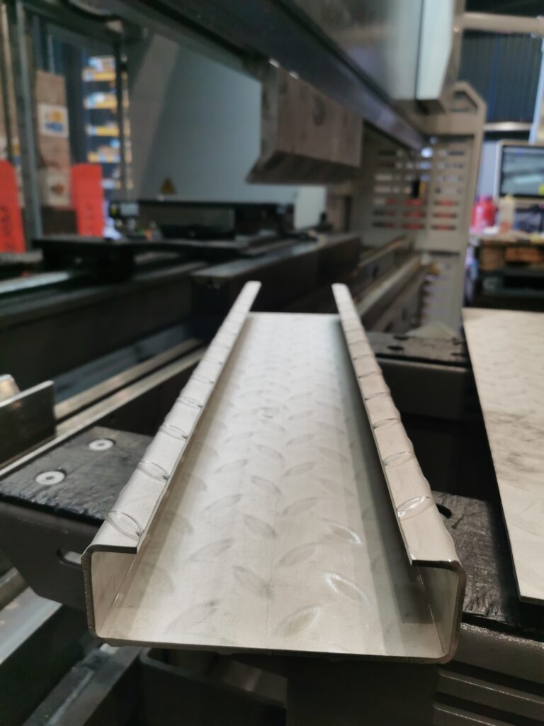a precision formed part using the rolla v tooling