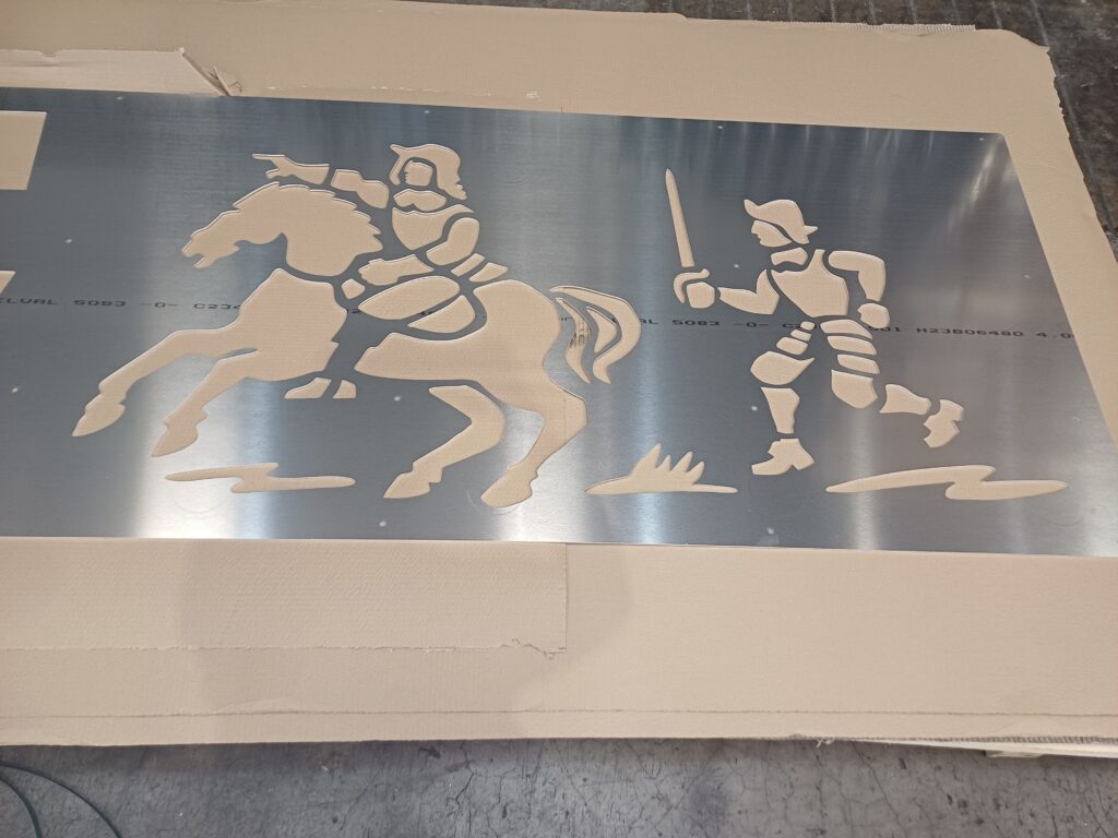 The plain laser cut panels before being powdercoated