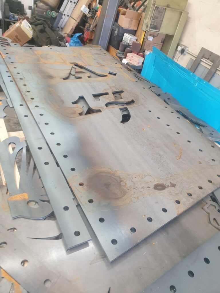 Laser cuts decorative panels for the Abraham Darby monument