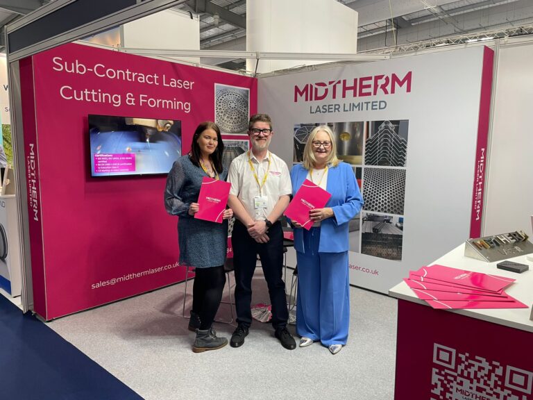 Emily sue and steve standing at our exhibition stand in farnborough 2025