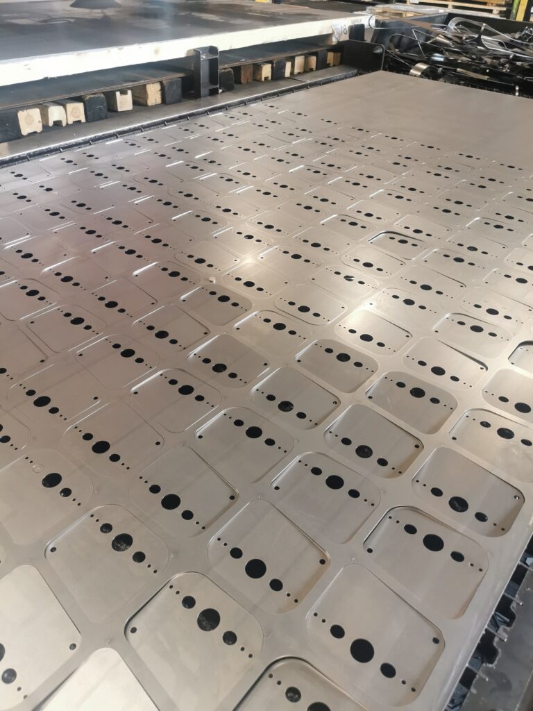 A photo to show lots of parts on the machine bed showcasing Precision and Repeatability in Everyday Parts