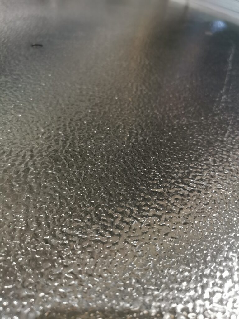 An image showing a sheet of patterned aluminium sheet