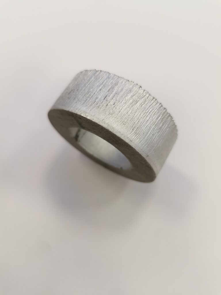 An image showing a 20mm aluminium ring laser cut at Midtherm Laser limited