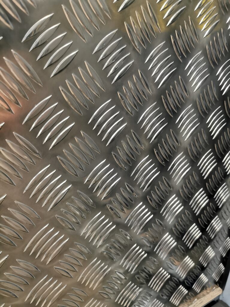 An image showing the surface finish of aluminium checker plate 5 bar tread plate which can be laser cut