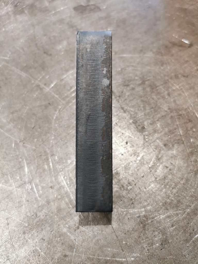 An image showing the edge of some 20mm mild steel sheet after its been laser cut using a fiber laser